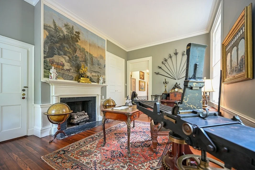 Next room!!!

This space was reimagined as an office, and there are several details that make it unique from the rest of the house.

First, you might notice a familiar pattern above the mantel&mdash;we didn&rsquo;t quite use all the Zuber wallpaper i