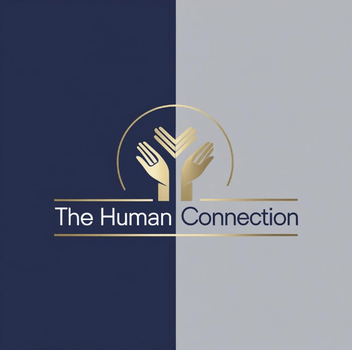 A logo with a split background, dark blue on the left and light gray on the right. It features two stylized hands reaching towards each other, one gold and one white, enclosed in a semi-circle. Below, the text reads 'The Human' on the left and 'Connection' on the right, with horizontal lines extending from each side.