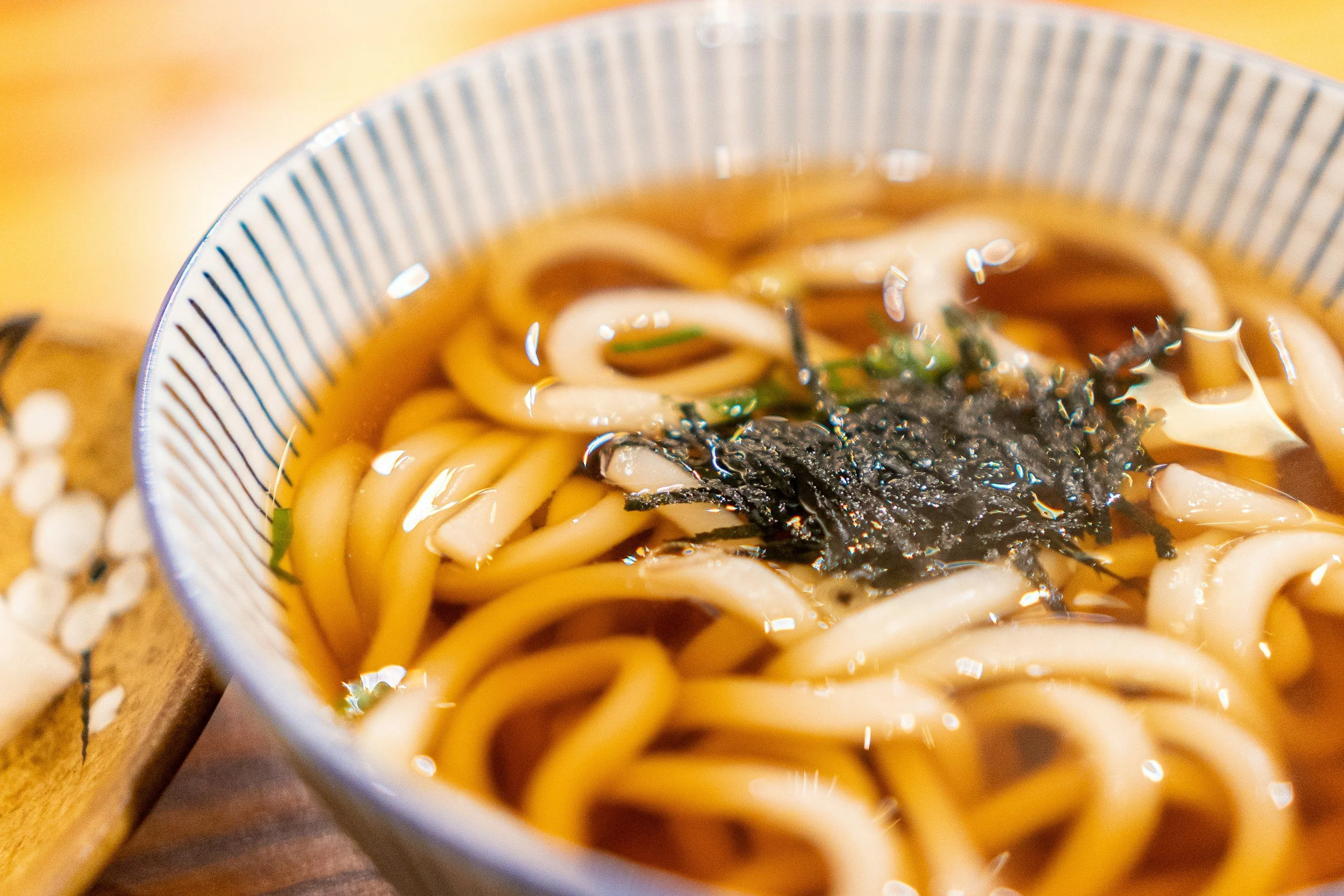 Udon noodles in a bowl of broth