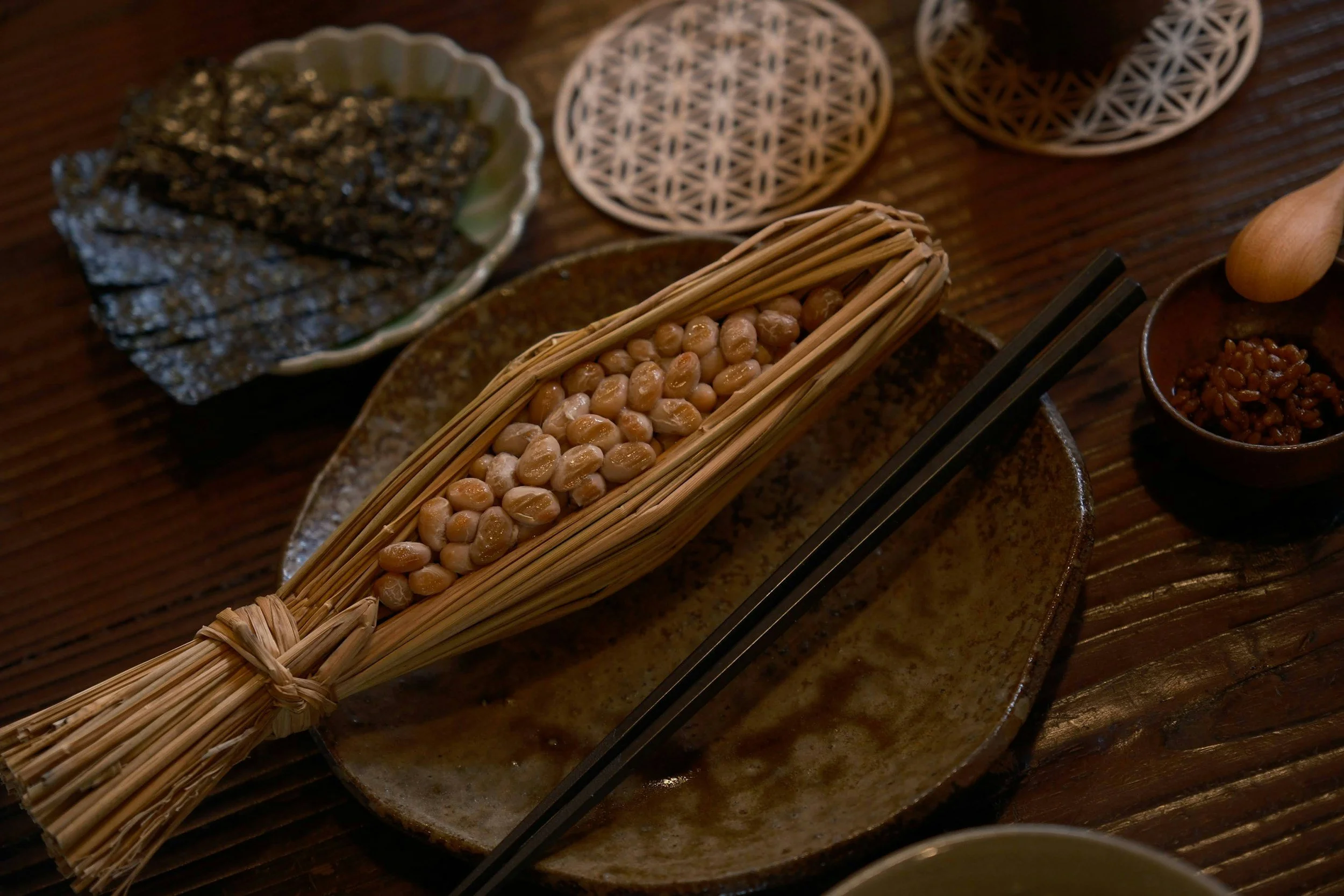 Natto being fermented in traditional straw