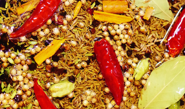 Curry spices, including chiles, coriander, cardamom and cumin seeds