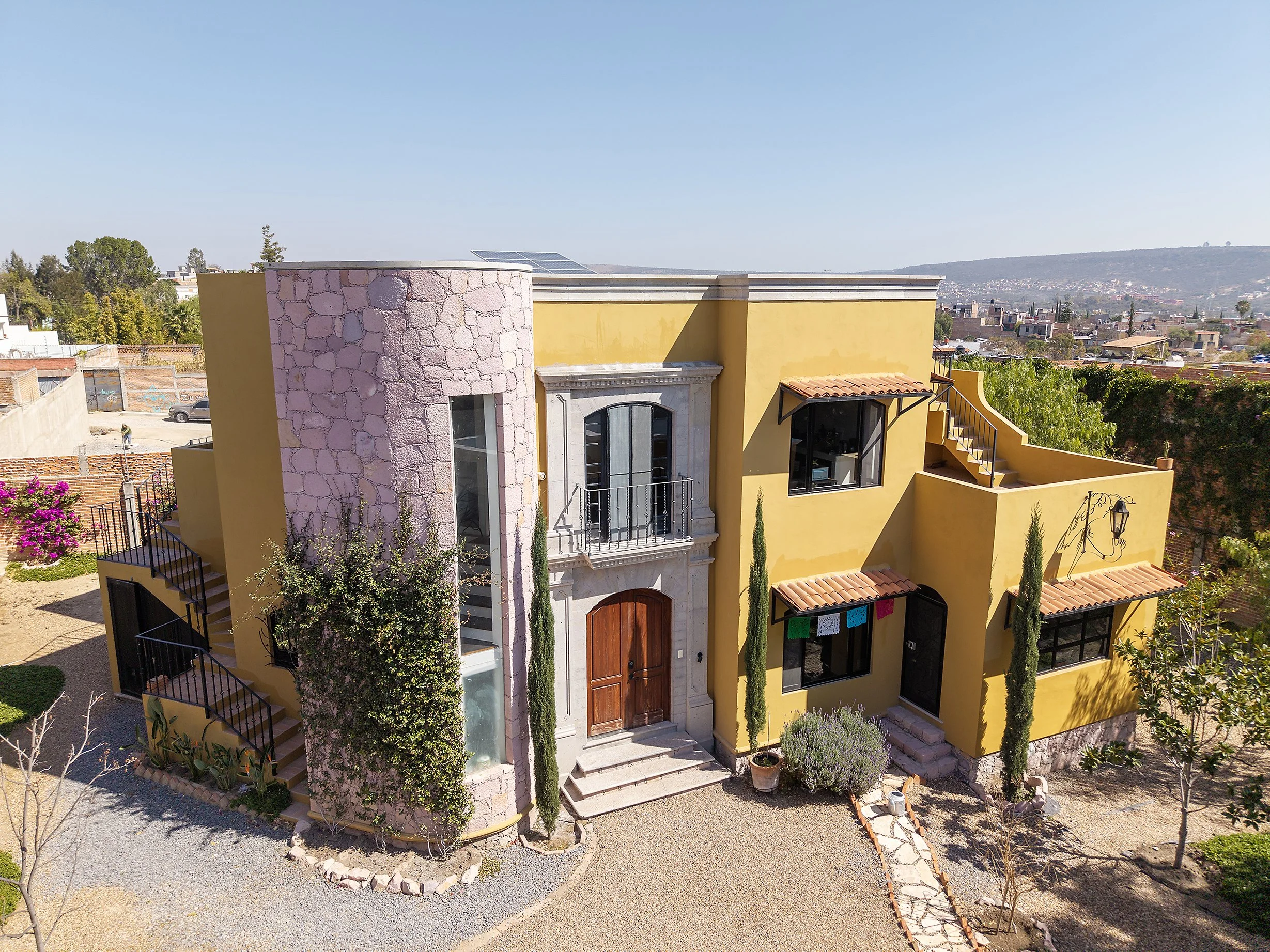 Colonial-style home with cantera entryway and balcony in San Miguel de Allende