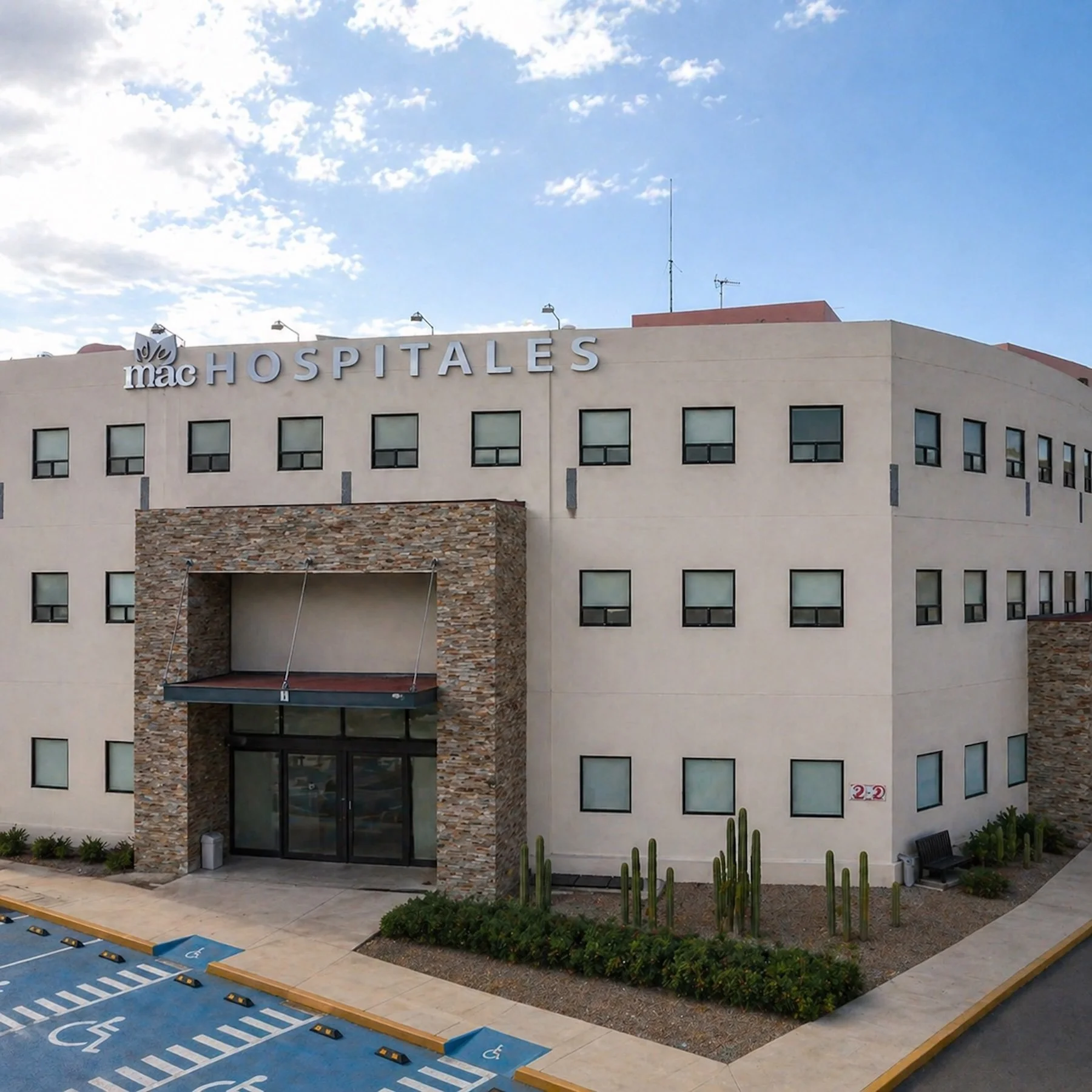 Exterior view of Mac Hospital in San Miguel de Allende with modern facade and main entrance visible