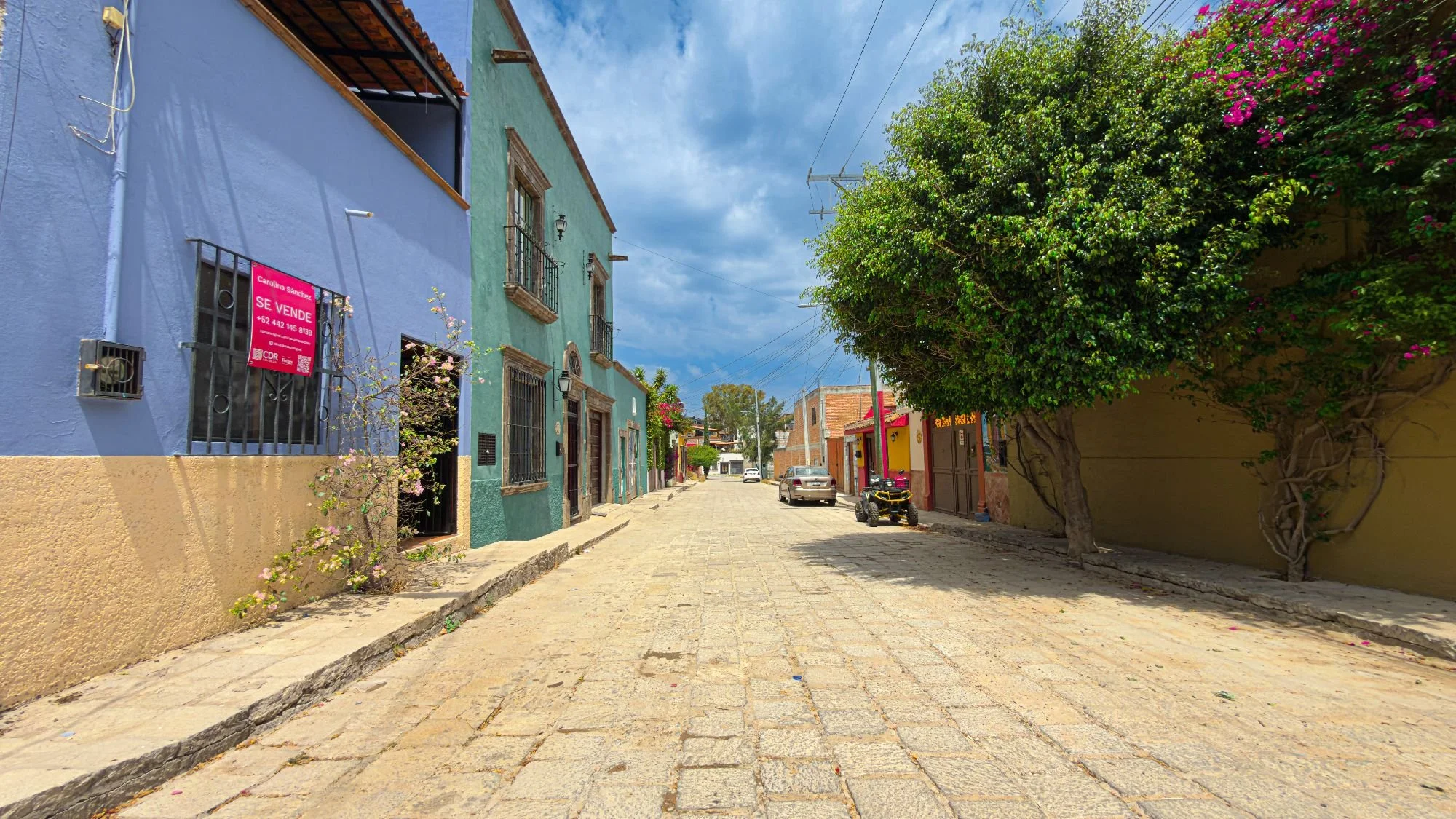 Casa Rosa exterior on a colorful street in Santa Julia, San Miguel de Allende
