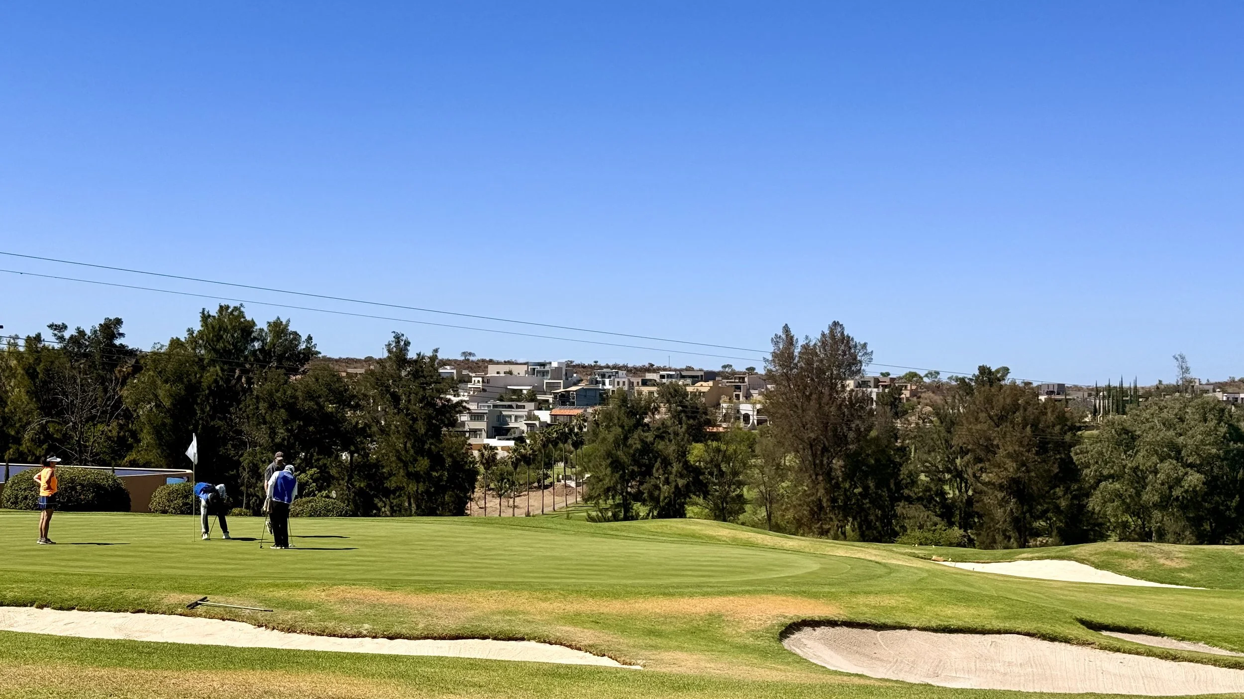 Malanquin Golf Course in San Miguel de Allende with golfers playing on a sunny day