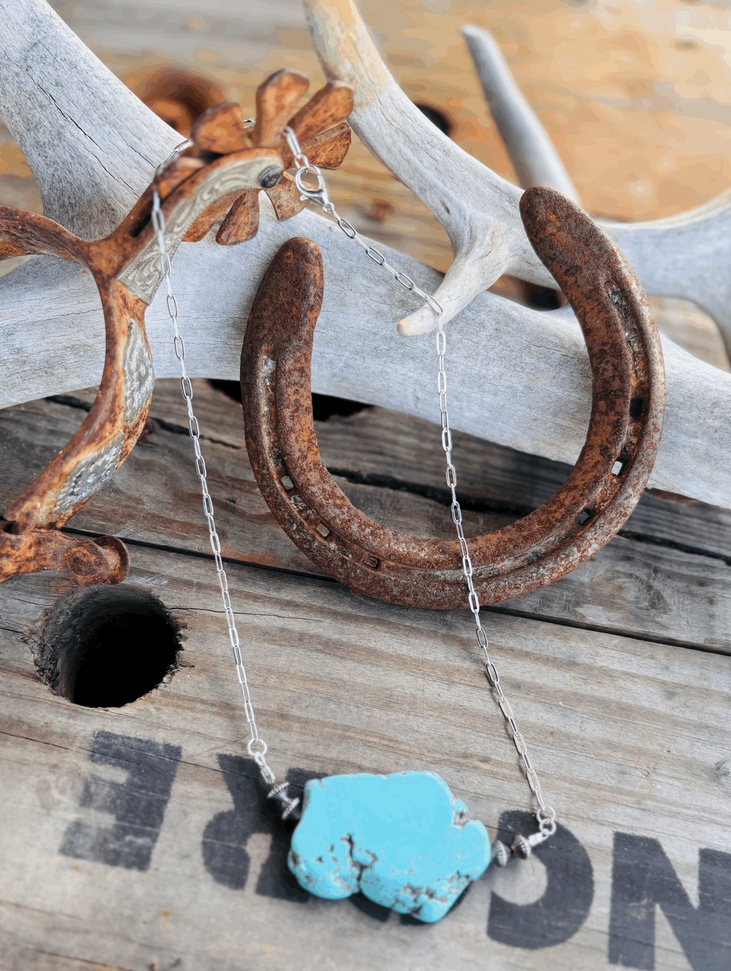 Lab created turquoise with texture spacers on a stainless steel paperclip chain