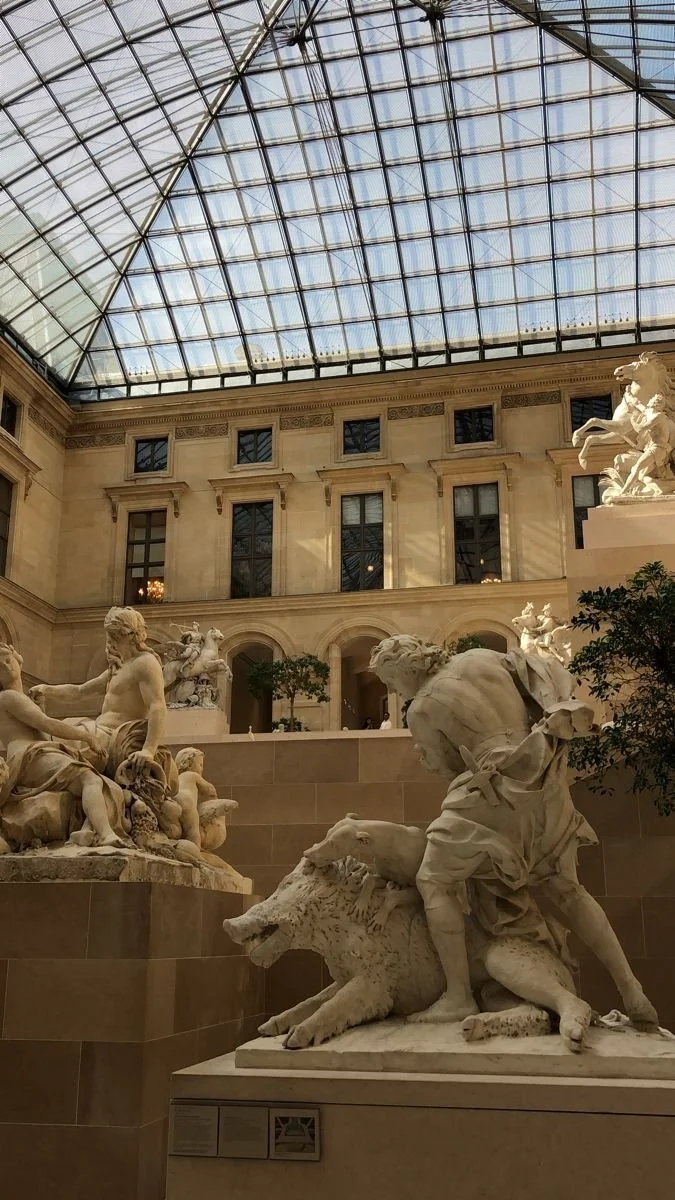 Statue inside the louvre in daylight in Paris, France
