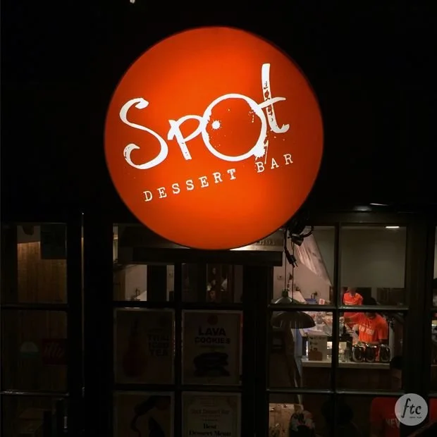 Spot dessert bar logo at night in New York City