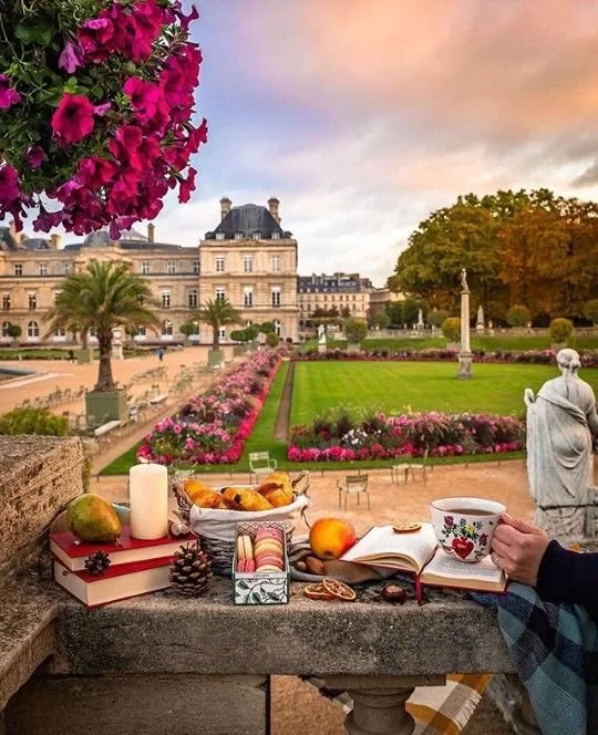 Picnic at the Luxembourg Gardens at sundown in Paris, France