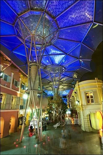 bustling clark quay street at night in Singapore
