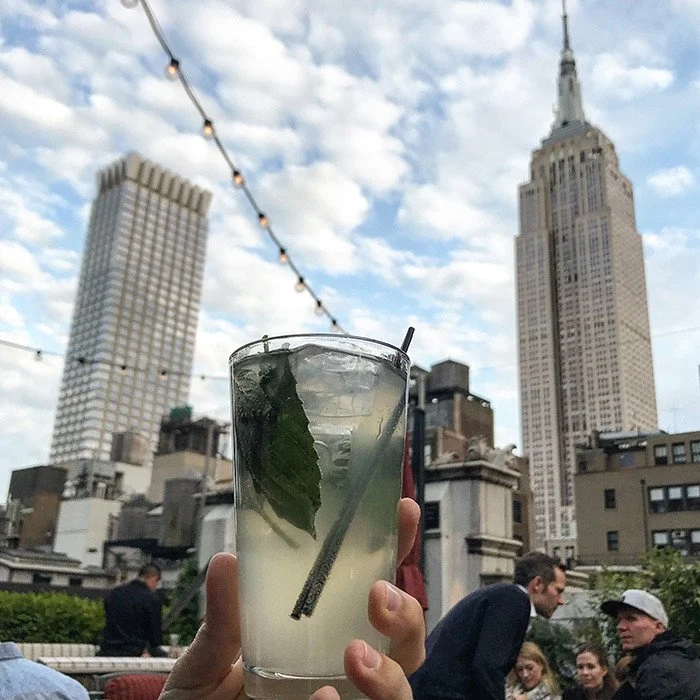 Refinery Rooftop mint drink with Empire State Building view NYC