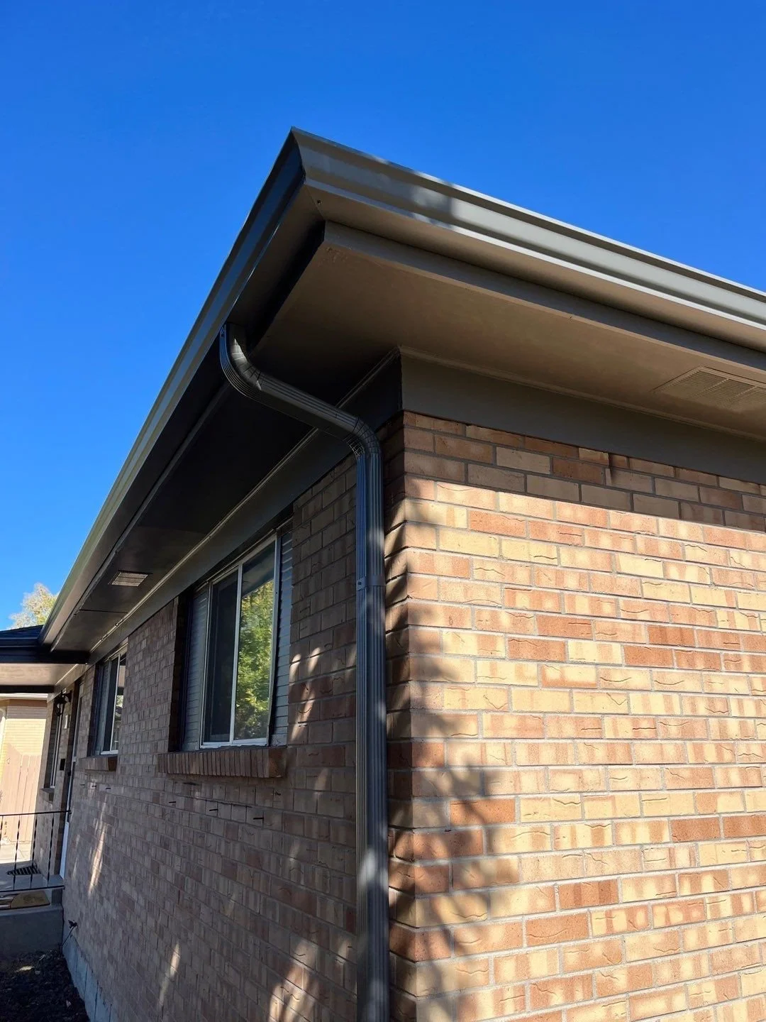northglenn-co-brick-home-gutter-and-downspout.jpg