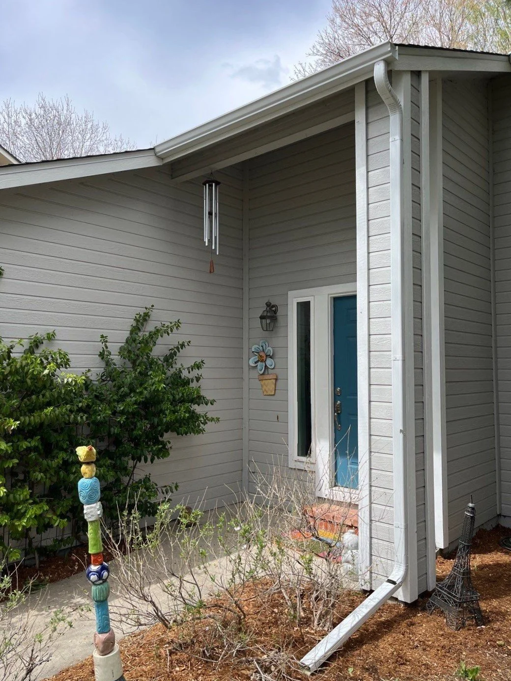 lafayette-co-white-downspout-extension-installation.jpg