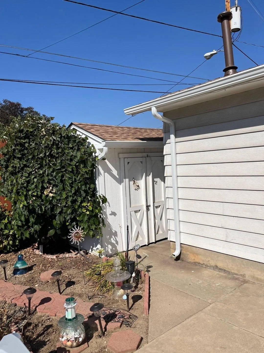 northglenn-co-white-gutter-and-downspout-garage.jpg