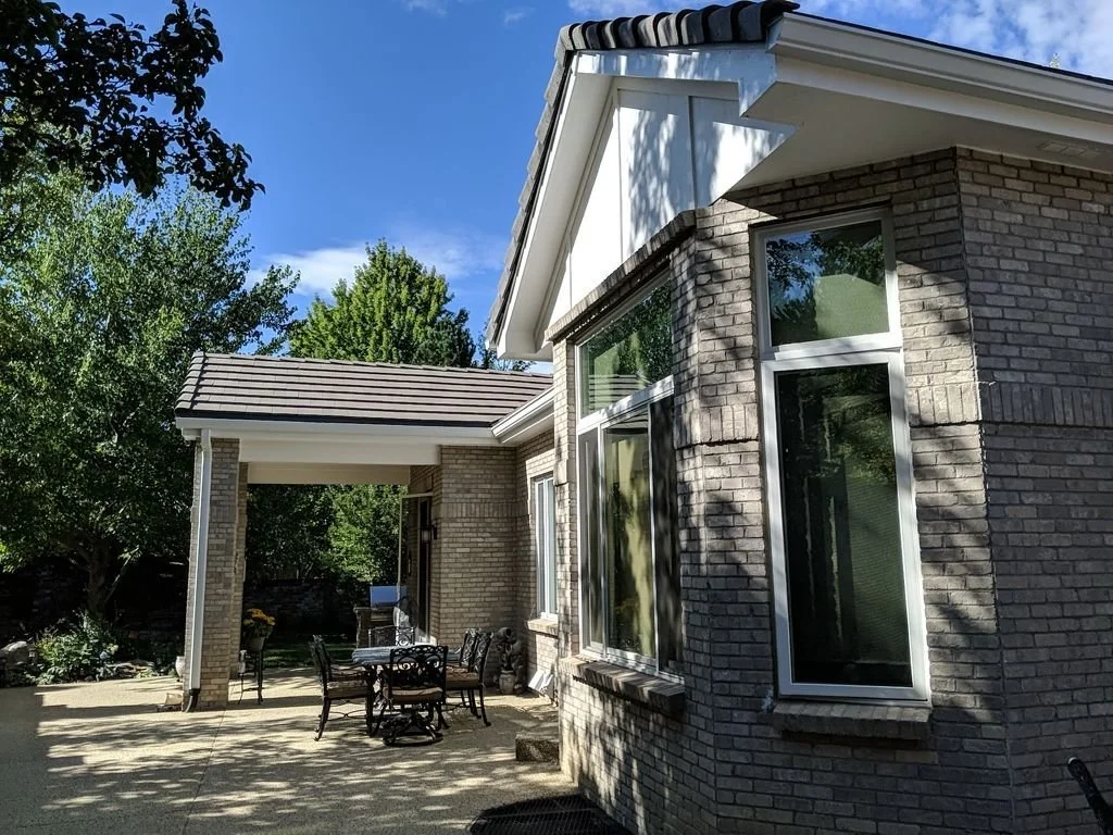 greenwood-village-co-brick-home-patio-gutter-installation.jpg