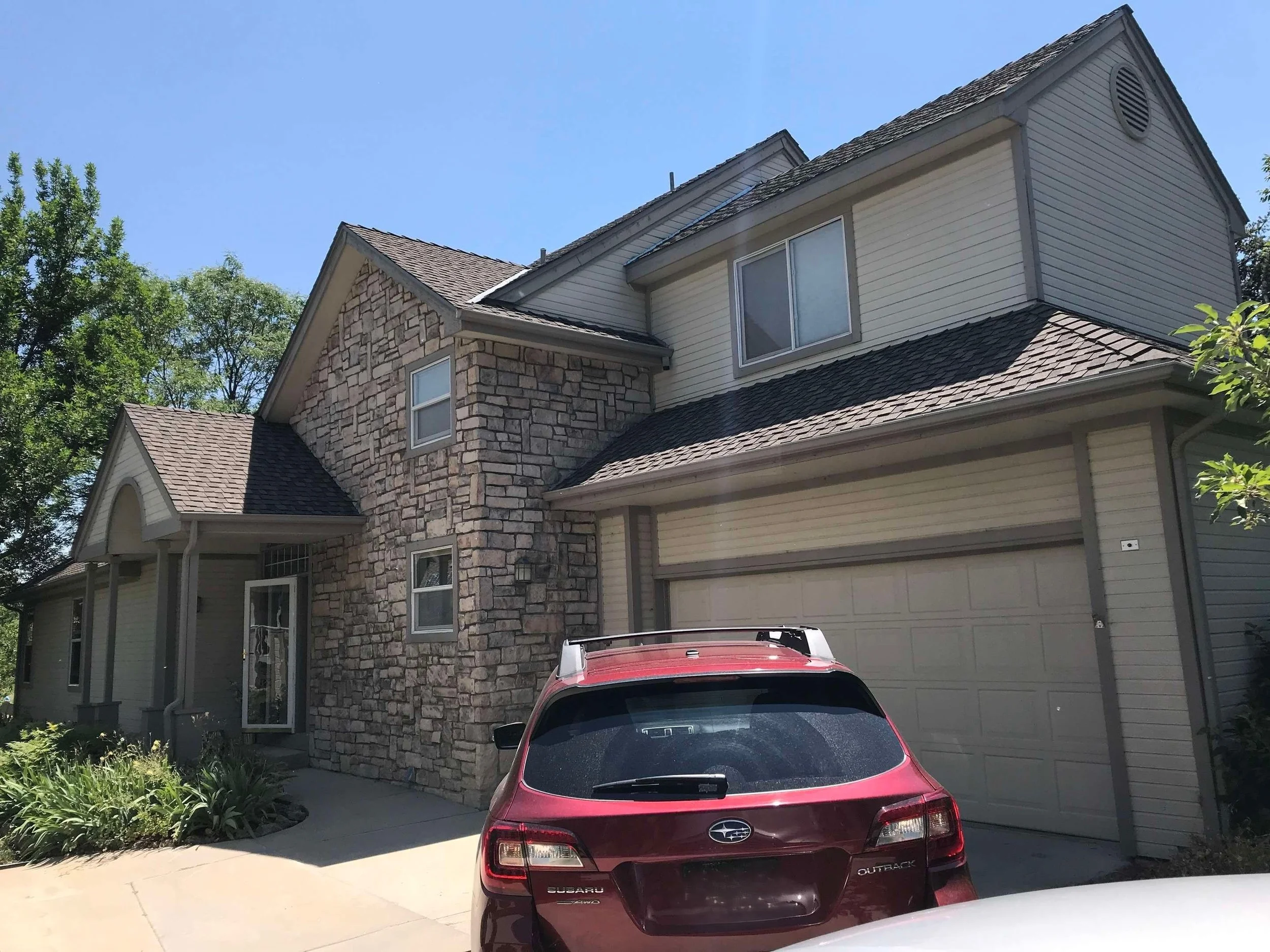 louisville-co-stone-home-seamless-gutter-installation.jpg