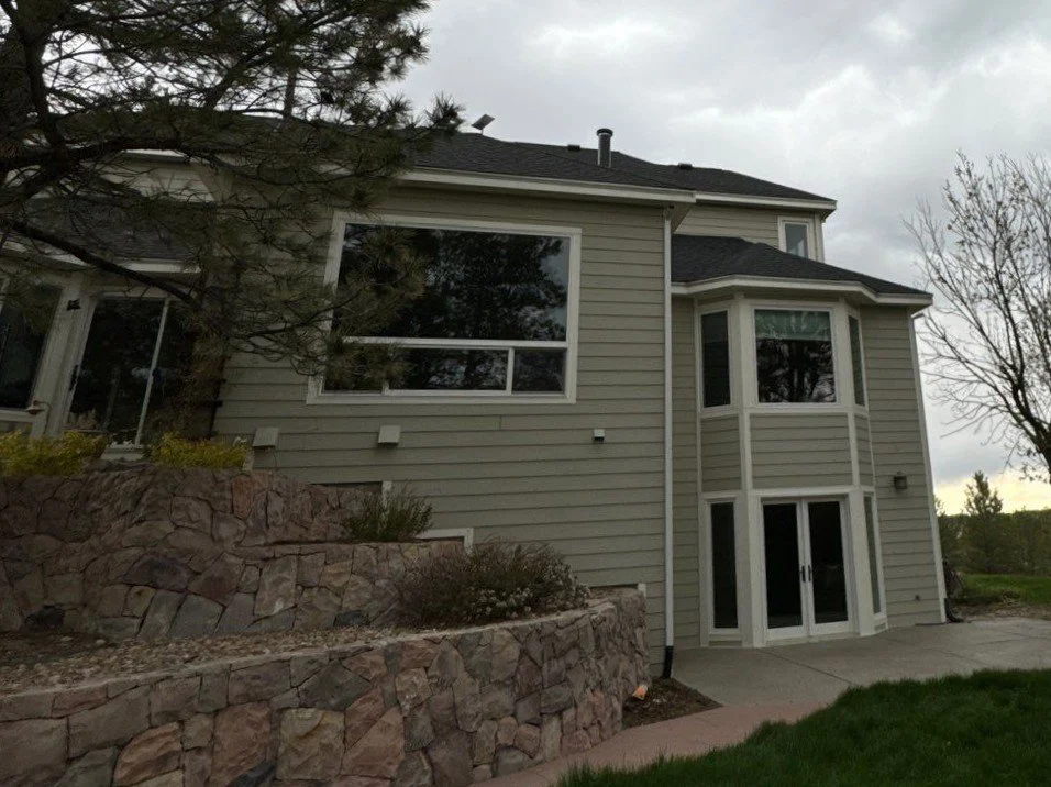 Parker home after hail-damaged gutters were removed and before new seamless gutters were installed.