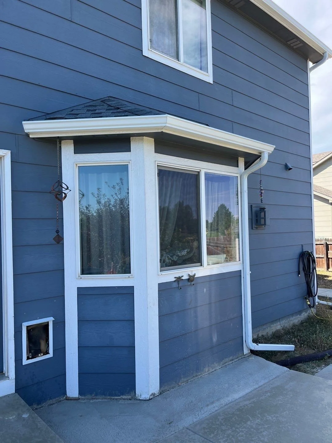 thornton-co-bay-window-gutter-and-downspout.jpg