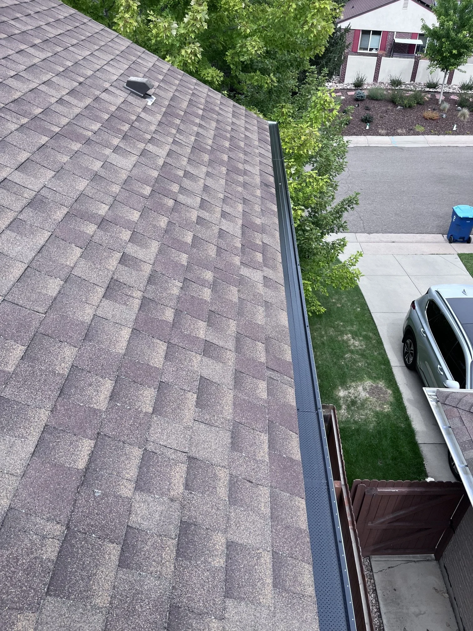Completed Real Gutter Cover installation running along the home’s roof edge.