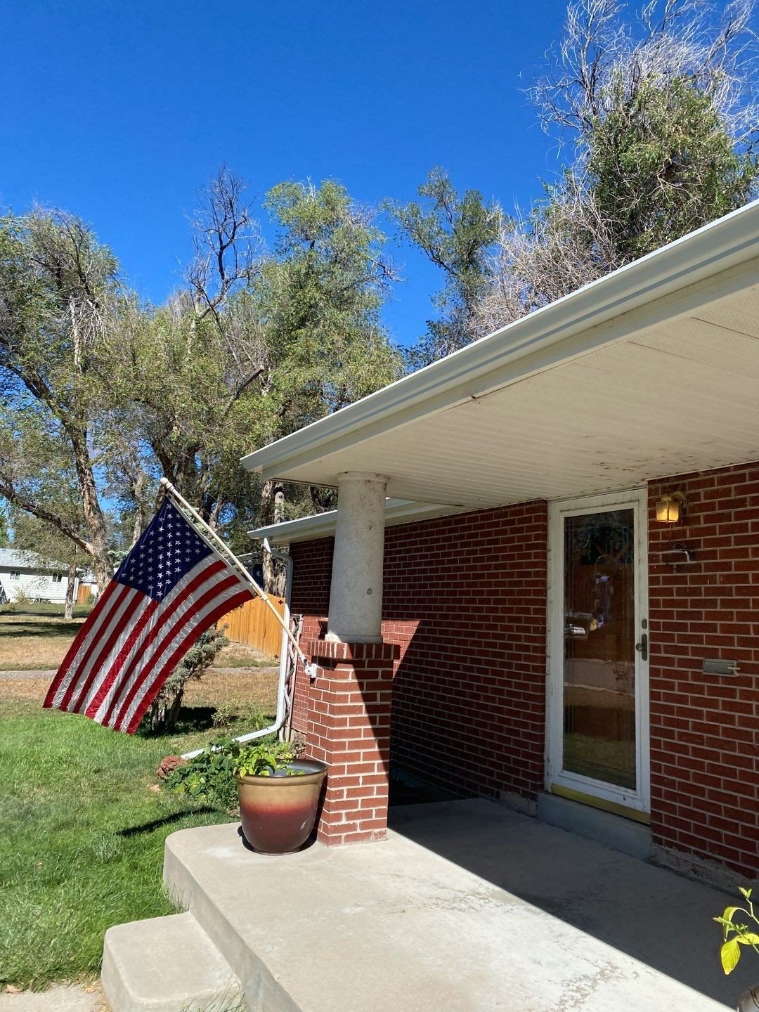 westminster-co-brick-ranch-porch-gutter-installation.jpg