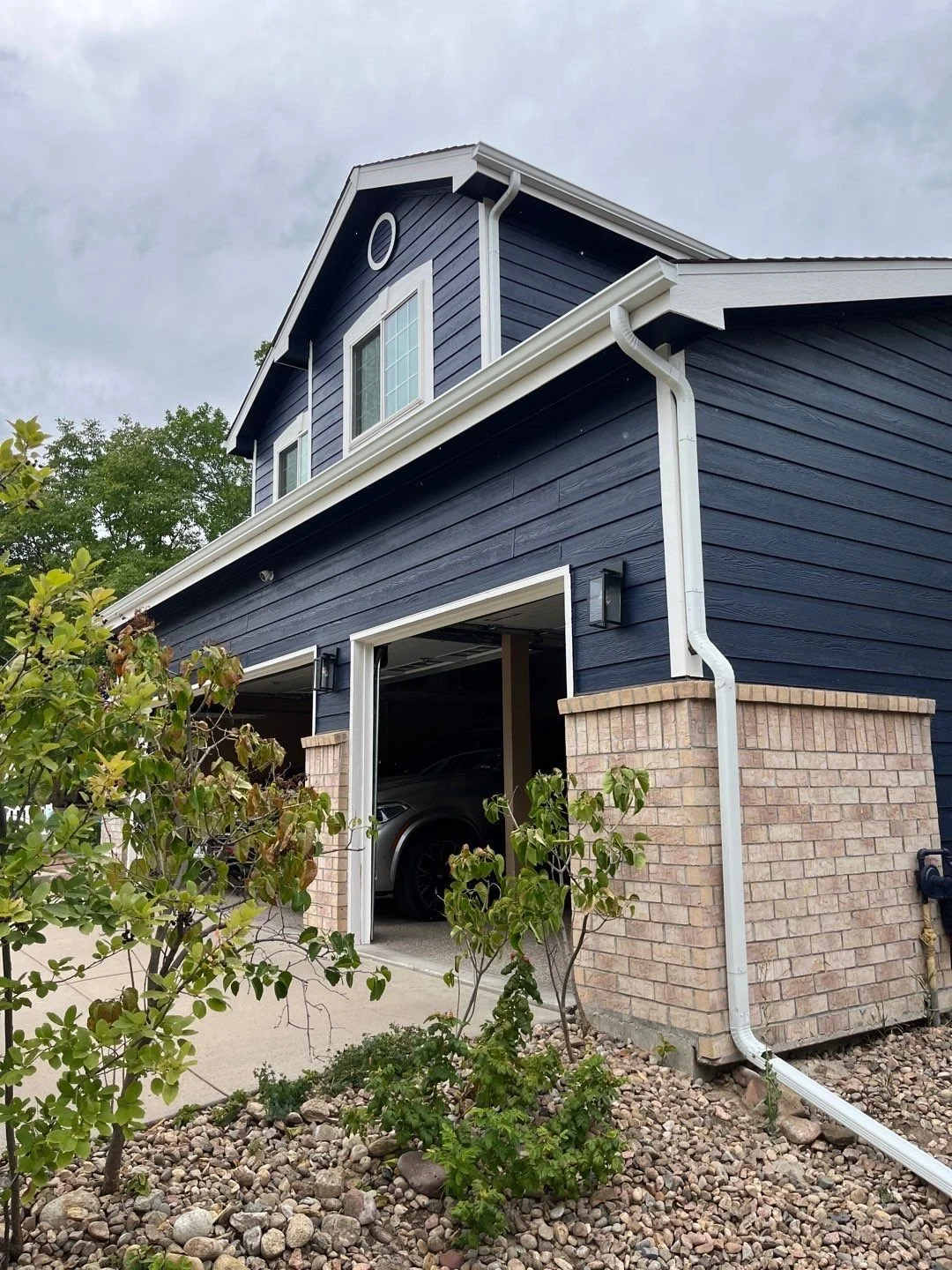 littleton-co-two-story-home-seamless-gutters-and-downspouts.jpg