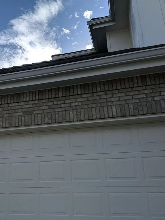 greenwood-village-co-white-gutter-over-garage.jpg