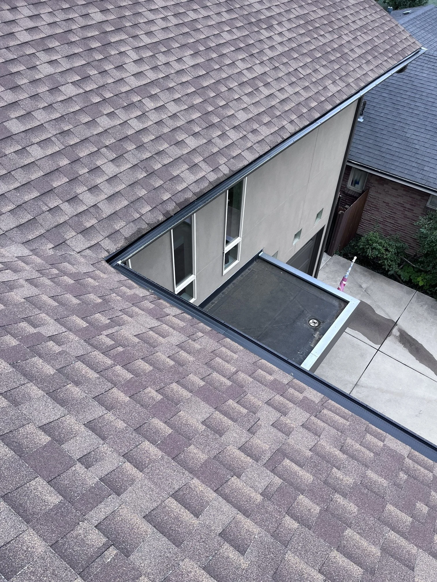 Five-inch Real Gutter Covers installed along the roofline of a Holly Hills home.