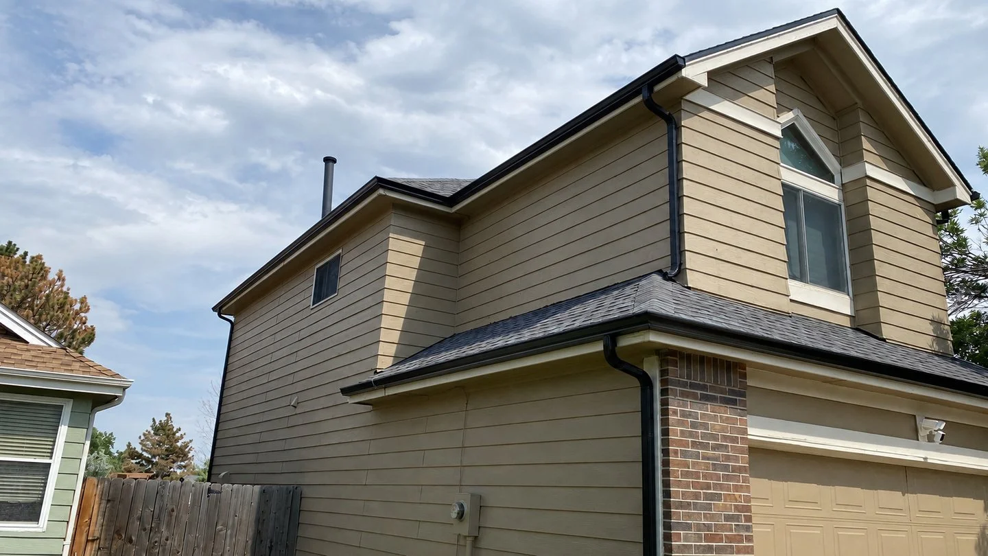 thornton-co-black-gutter-system-side-garage.jpg