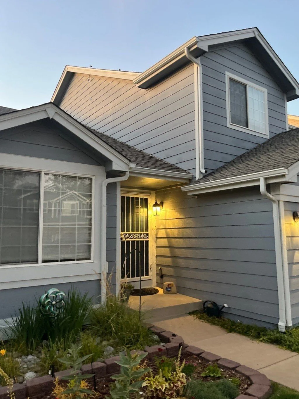 thornton-co-front-entry-gutter-and-downspout.jpg