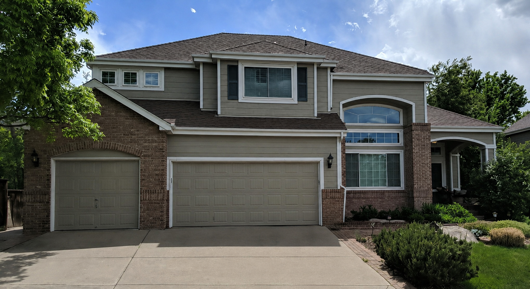 lone-tree-co-finished-gutter-replacement-brick-home.png