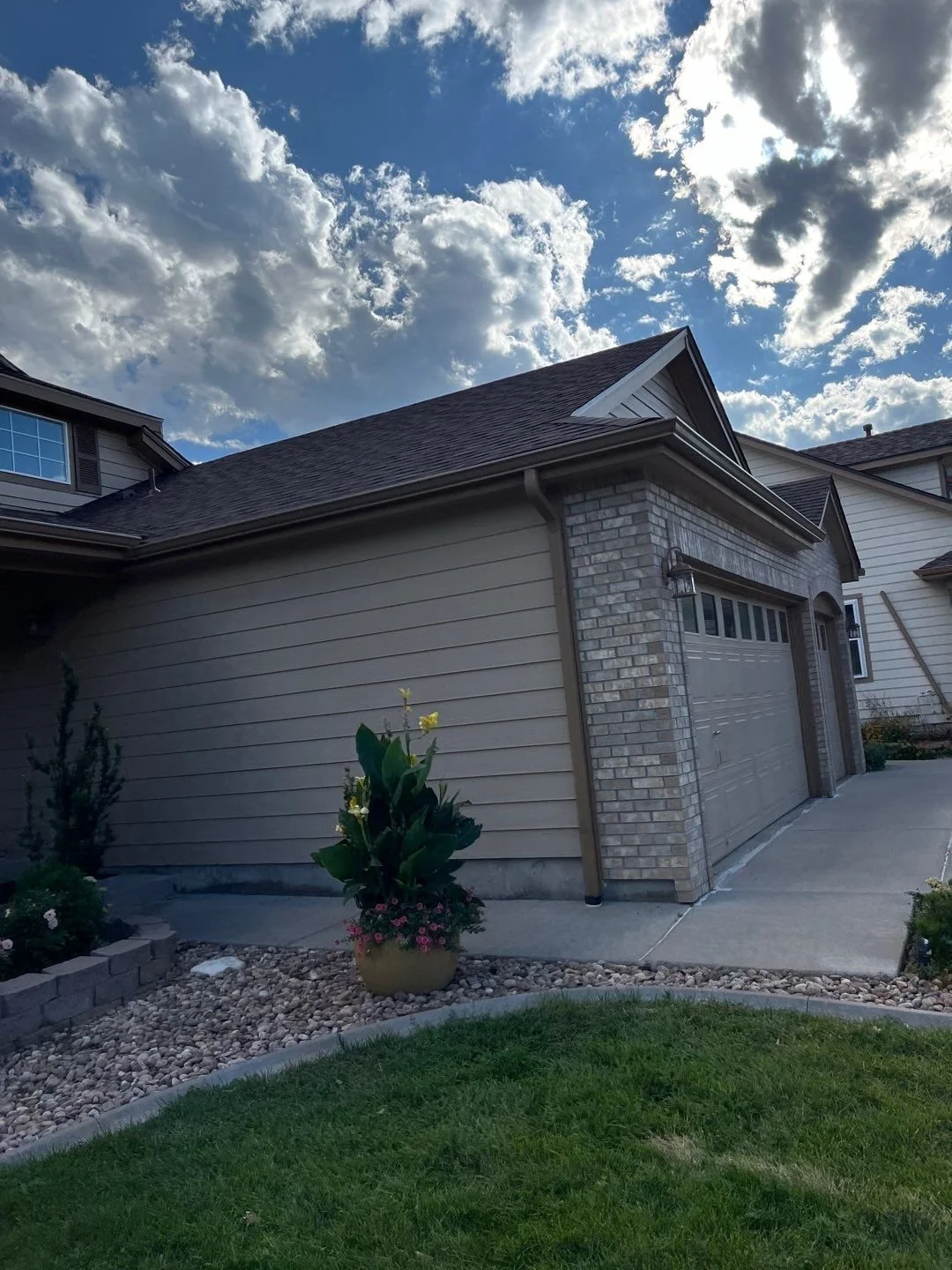 thornton-co-black-gutter-replacement-garage-exterior.jpg