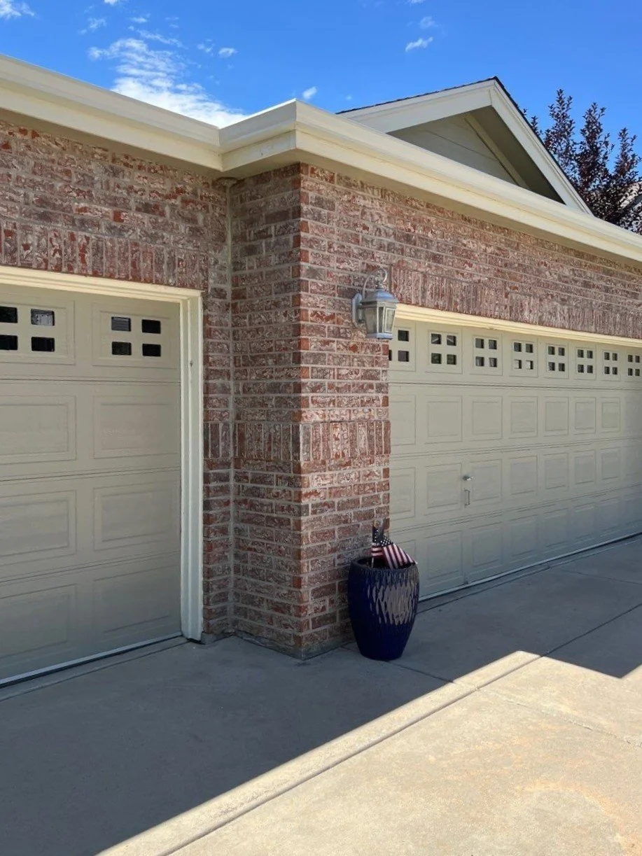 erie-co-seamless-gutters-brick-garage.jpg