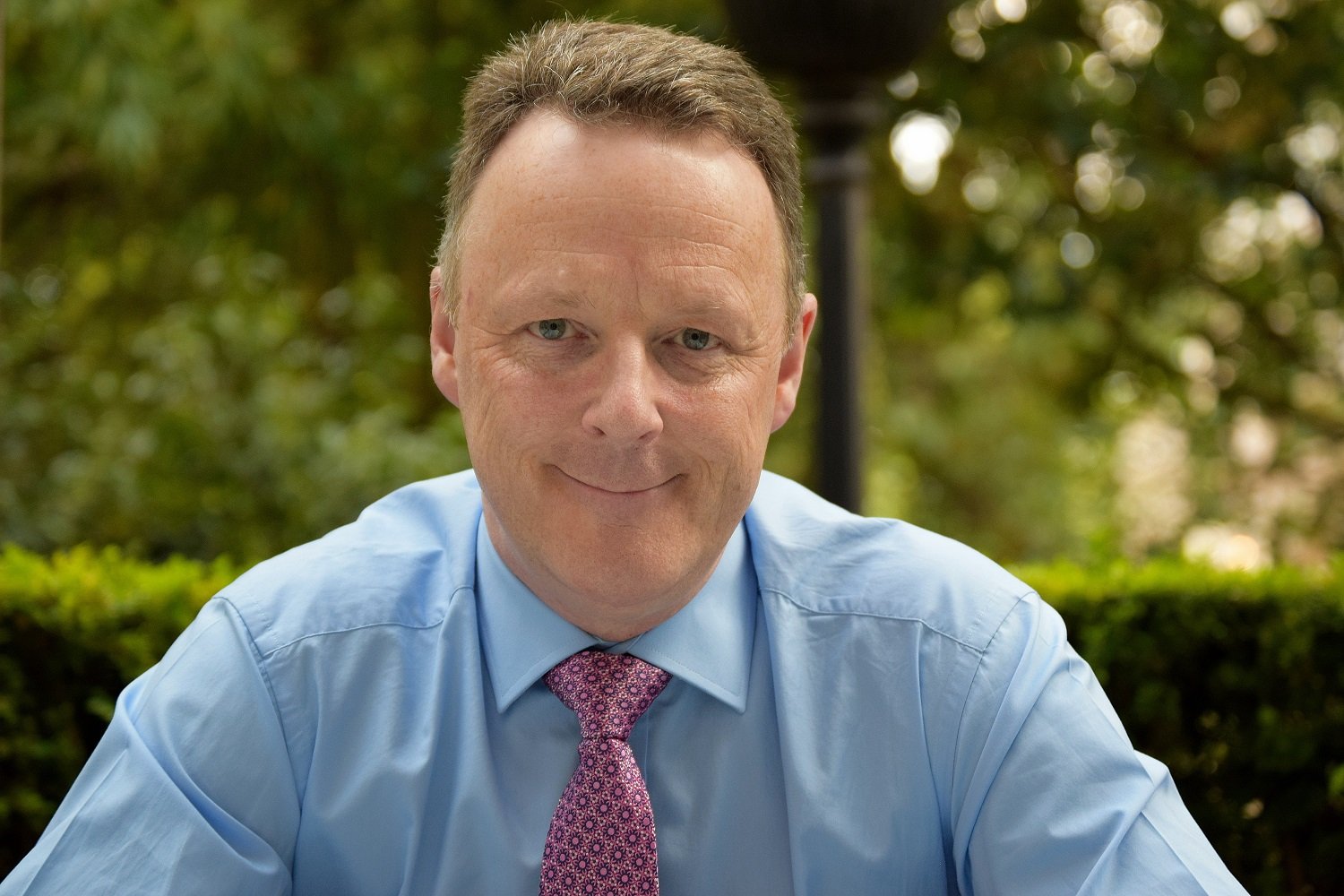 Portrait photo of Jonathan Kemp smiling