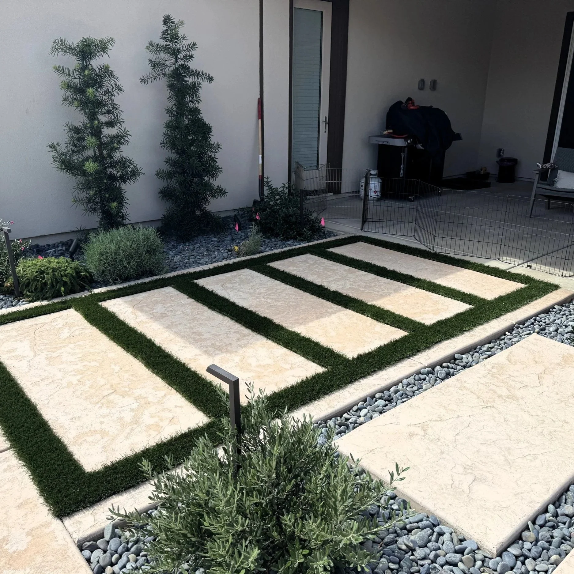 Concrete steps with artificial turf in the gaps