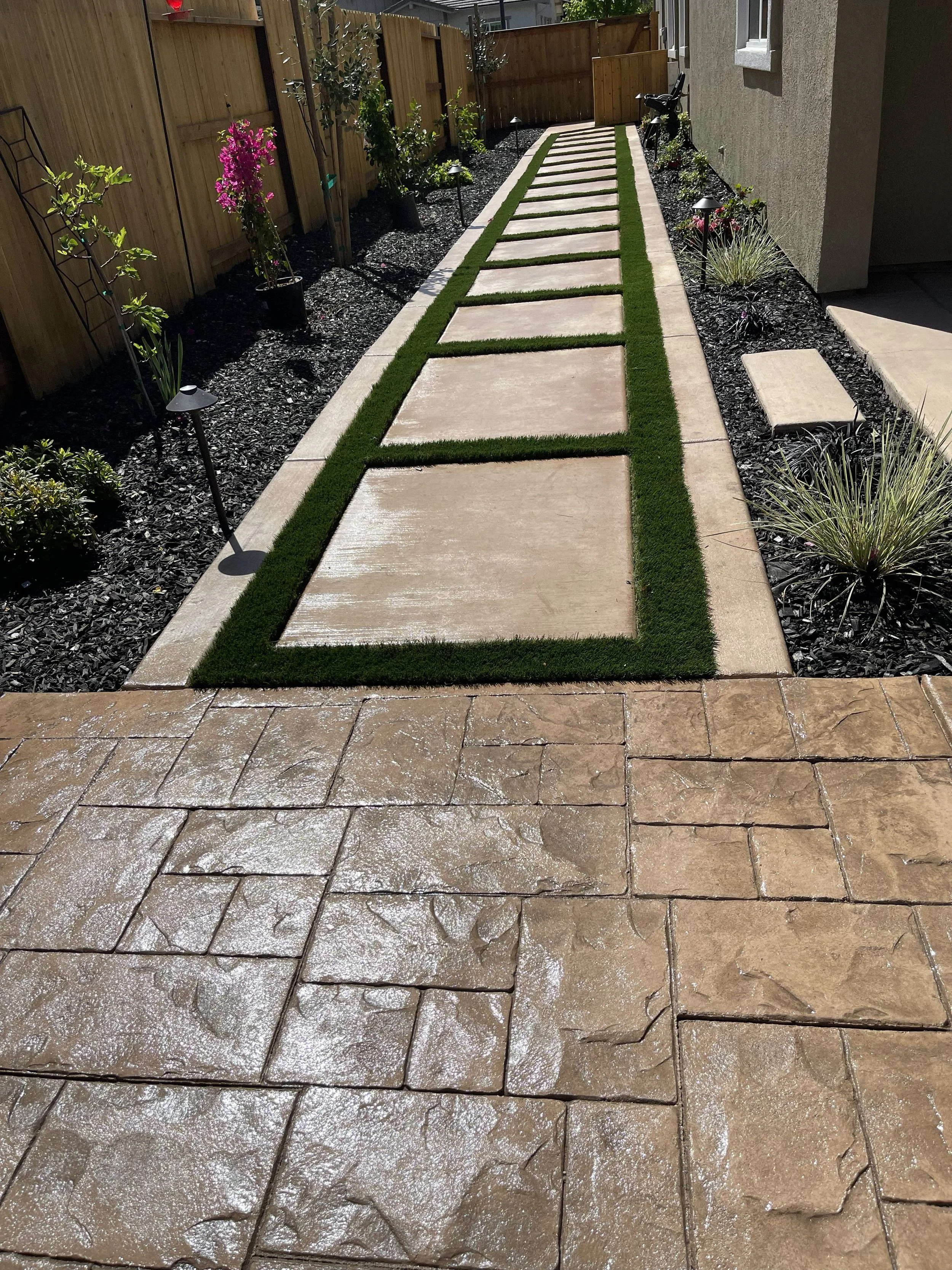 concrete steps and paver stamp patio.jpeg