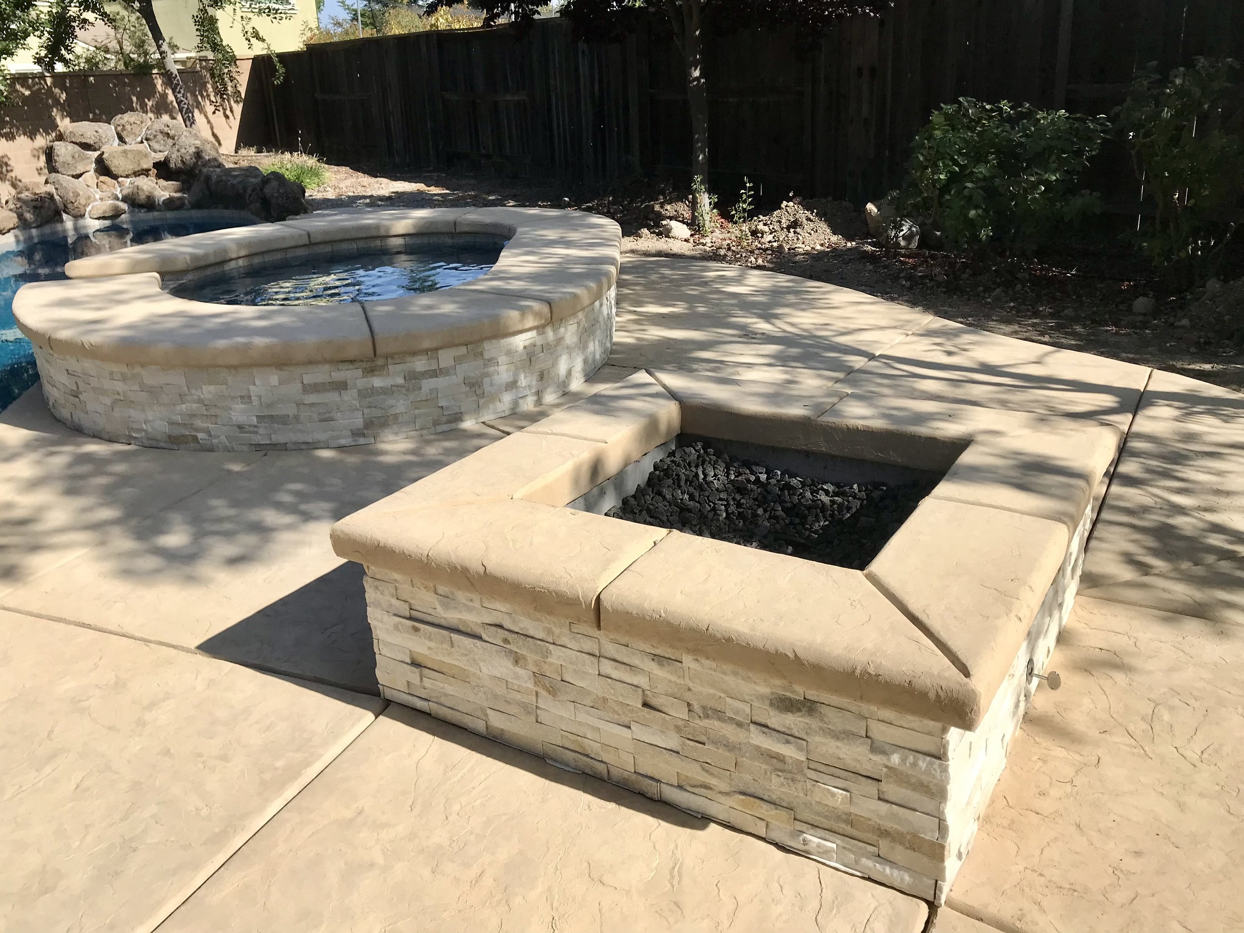 stone spa and fire pit.jpg