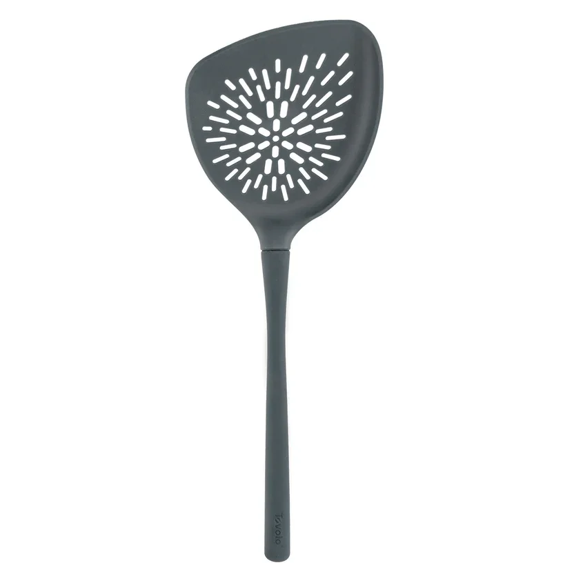 A black slotted spatula with a perforated head and long handle.