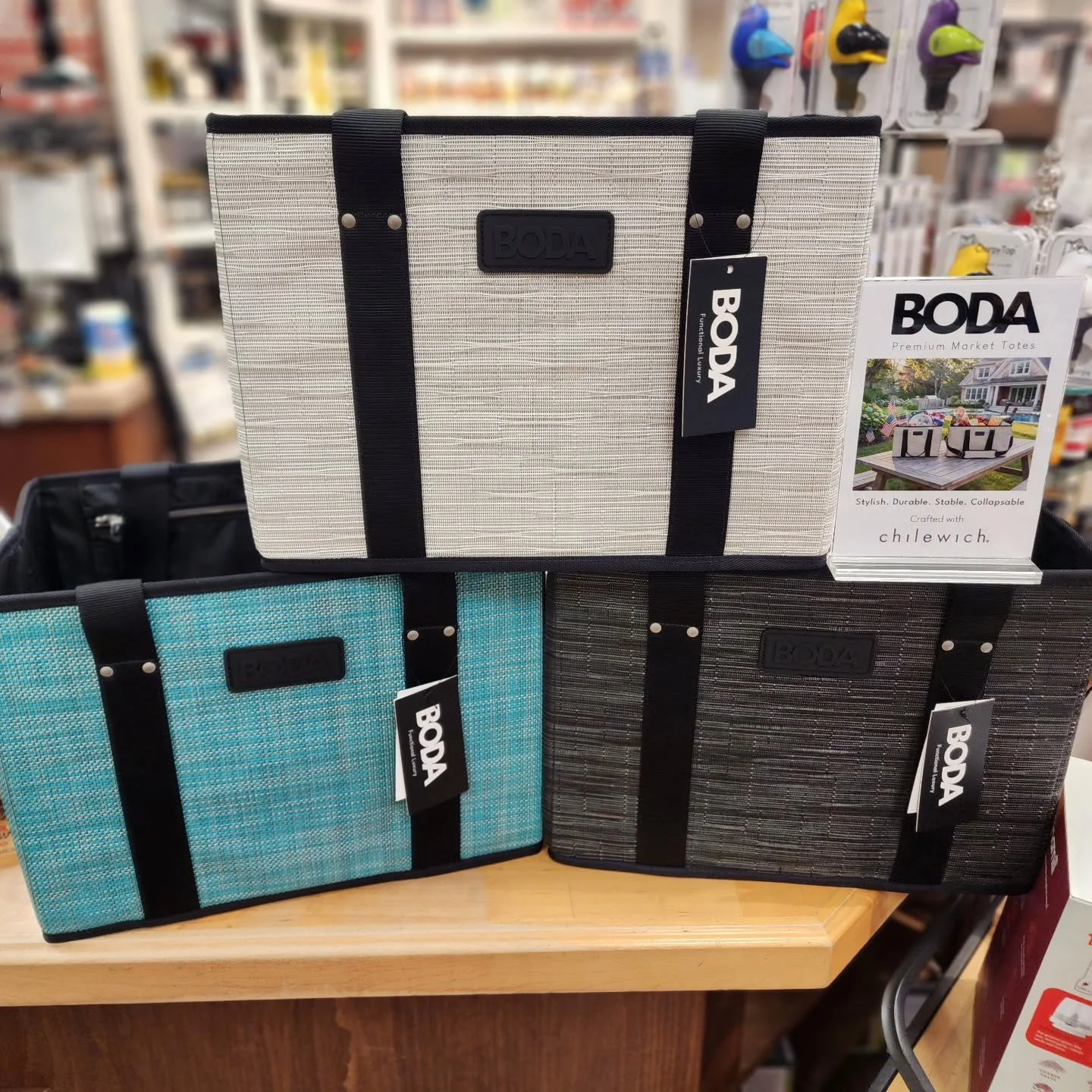 🛒 From the grocery store to the picnic blanket

We are now carrying Boda tote bags! Made in the USA from high quality Chilewich fabric, they're the ultimate do-it-all bag - sturdy enough to handle your grocery hauls, classy enough for your next wine