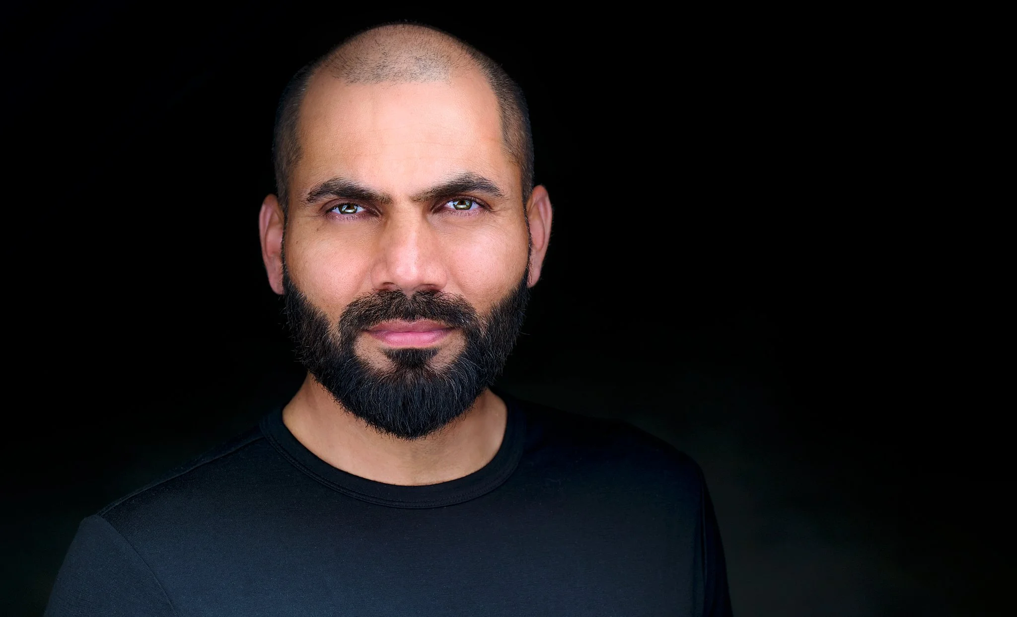 Ghulam Ahmad Headshot White_1.jpg