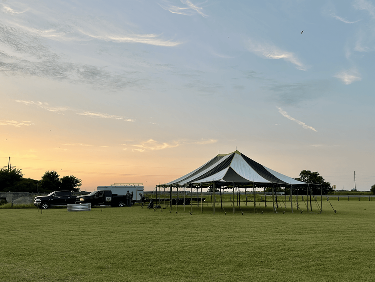 Revival tent set up at sunset before an evening service