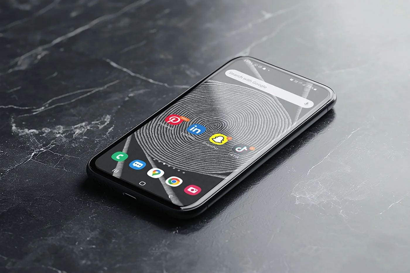 Samsung-phone-with-black-and-white-line-art-wallpaper-and-homescreen-with-app-icons-laying-on-black-marble-table