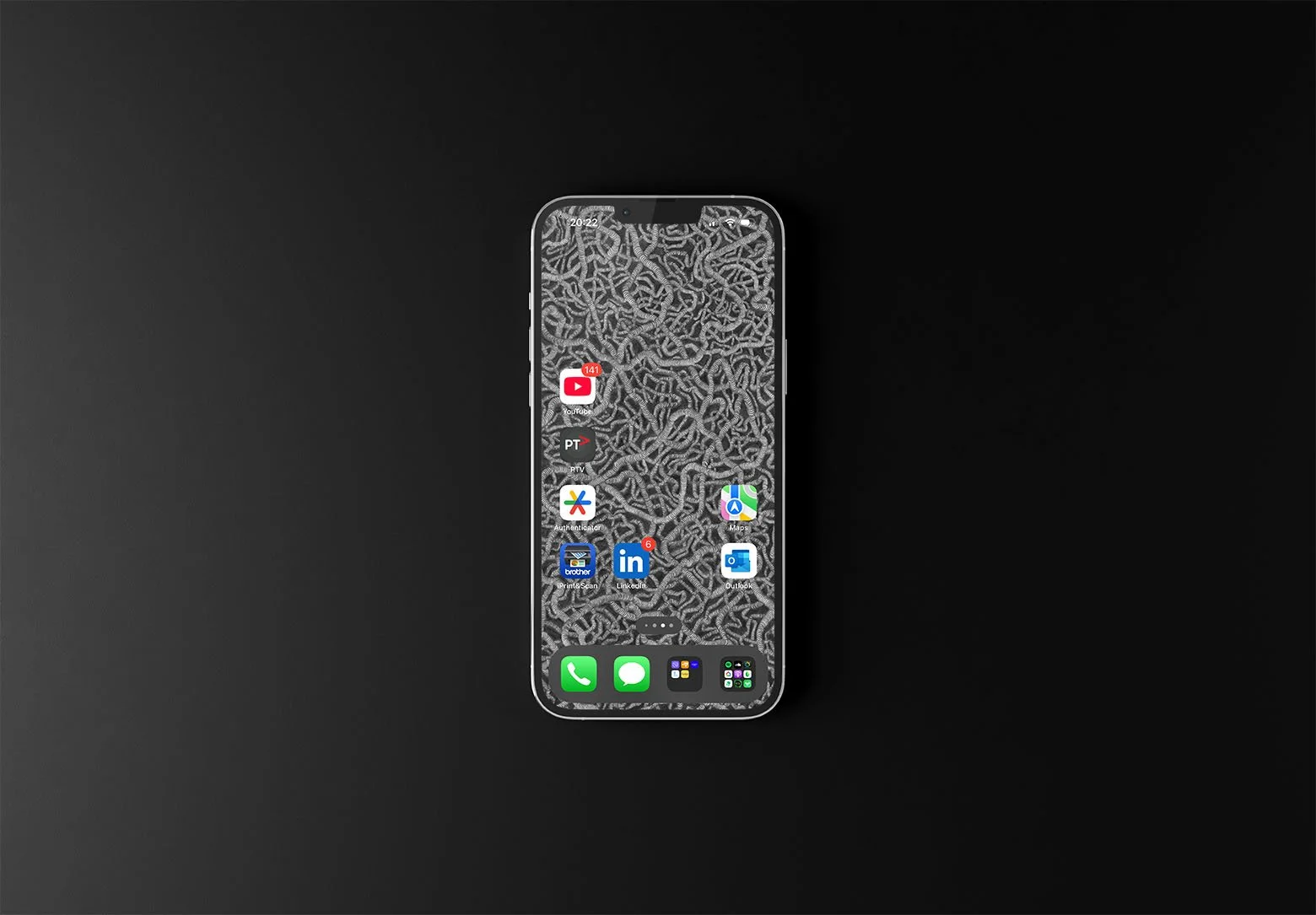 Iphone-with-black-and-white-line-art-wallpaper-with-app-icons-over-black-and-white-gradient-background.jpg
