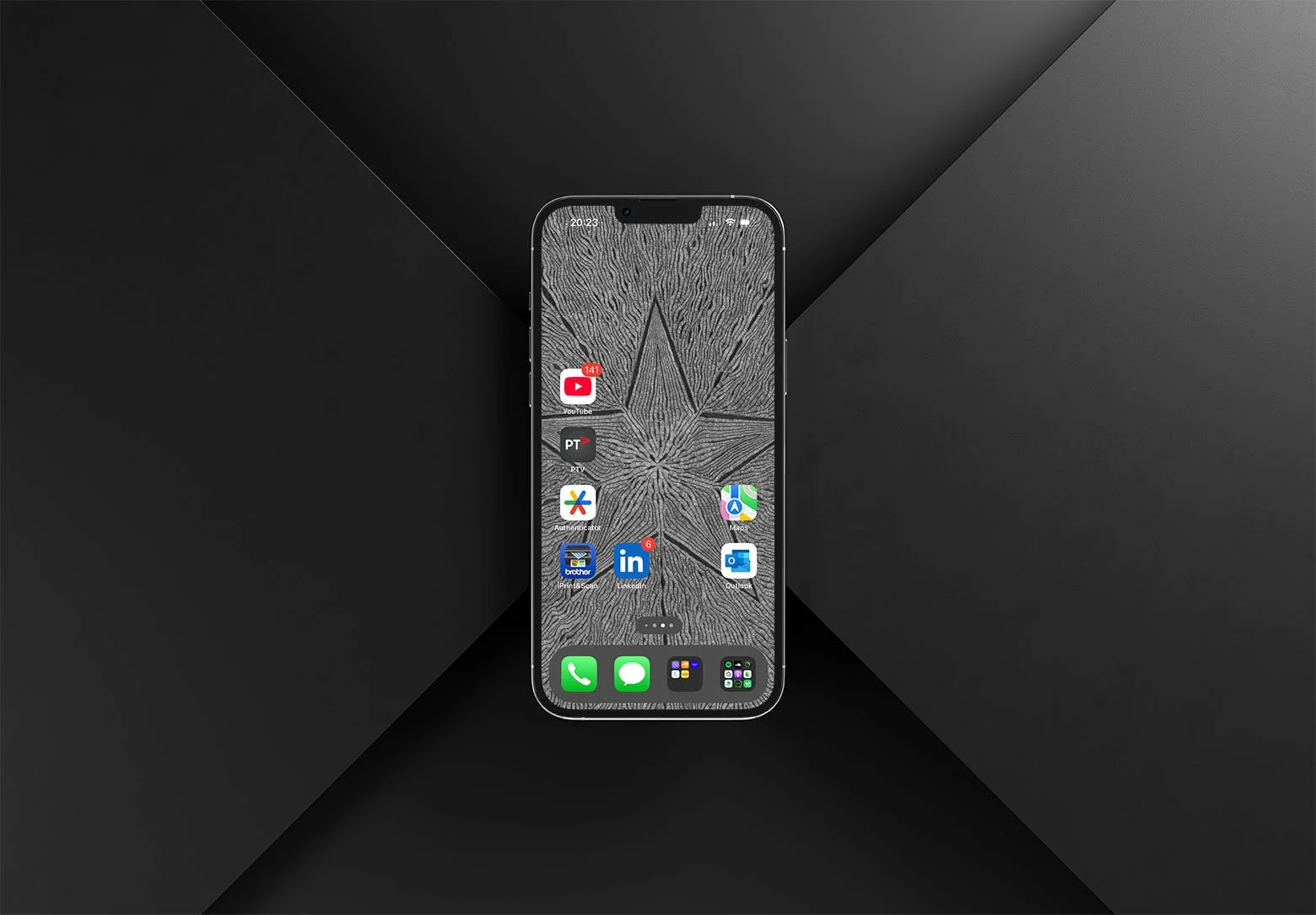 Iphone-with-black-and-white-line-art-wallpaperwith-app-icons-with-two-tone-black-background.jpg