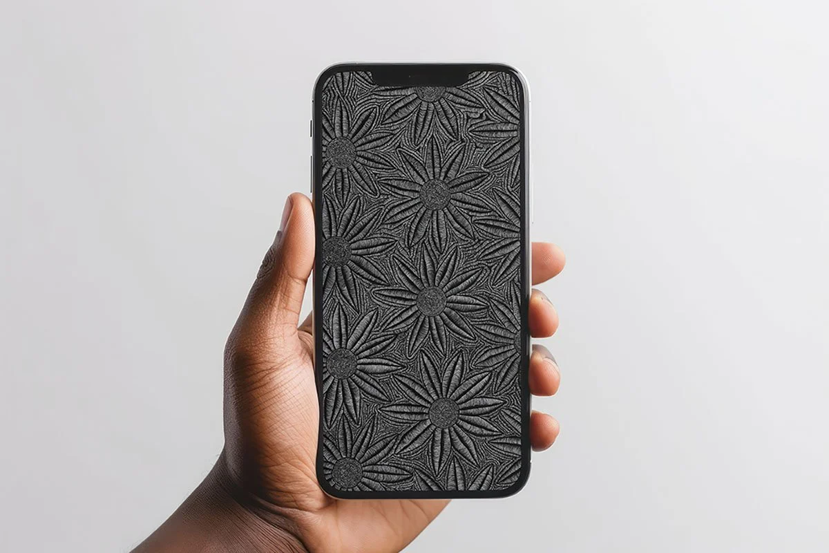 Person-holding-Iphone-with-black-and-white-line-art-wallpaper-with-white-background