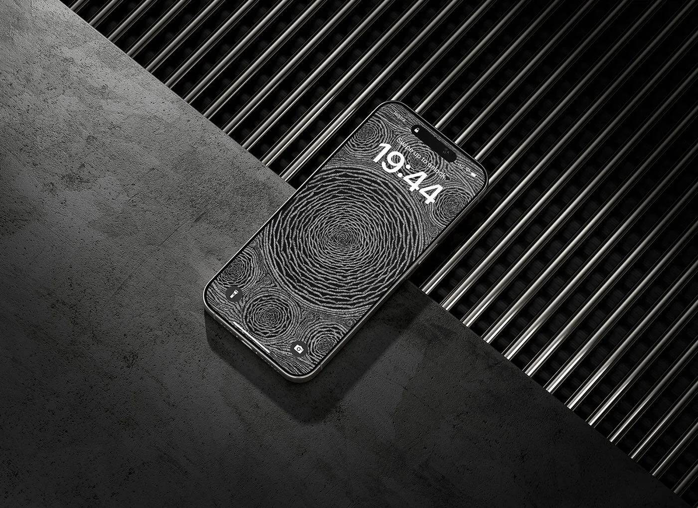 Iphone-with black-and-white line-art-wallpaper-with-lockscreen-laying-on-concrete-and-steel-rod-surface