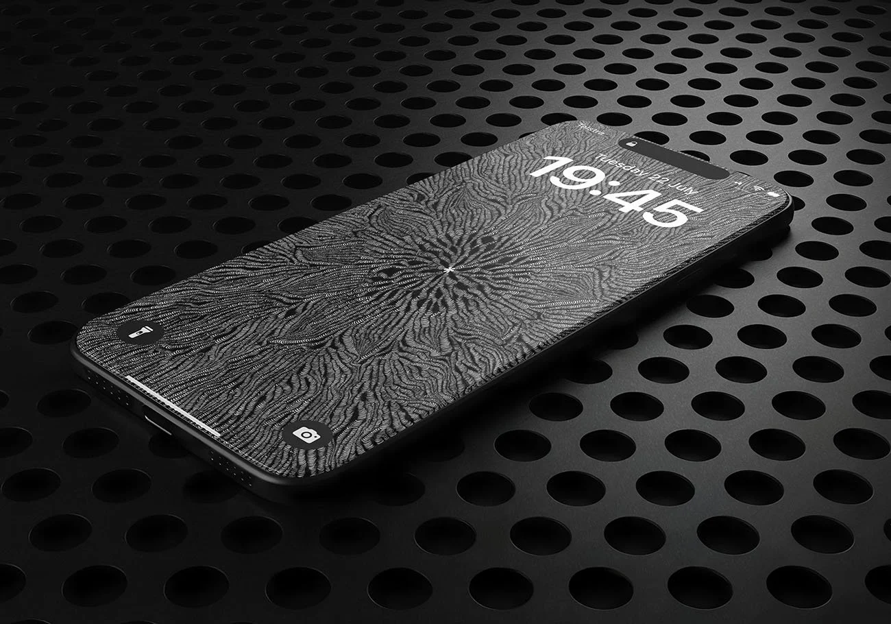 Iphone-with black-and-white line-art-wallpaper-laying-on black-surface-with-perforated-holes