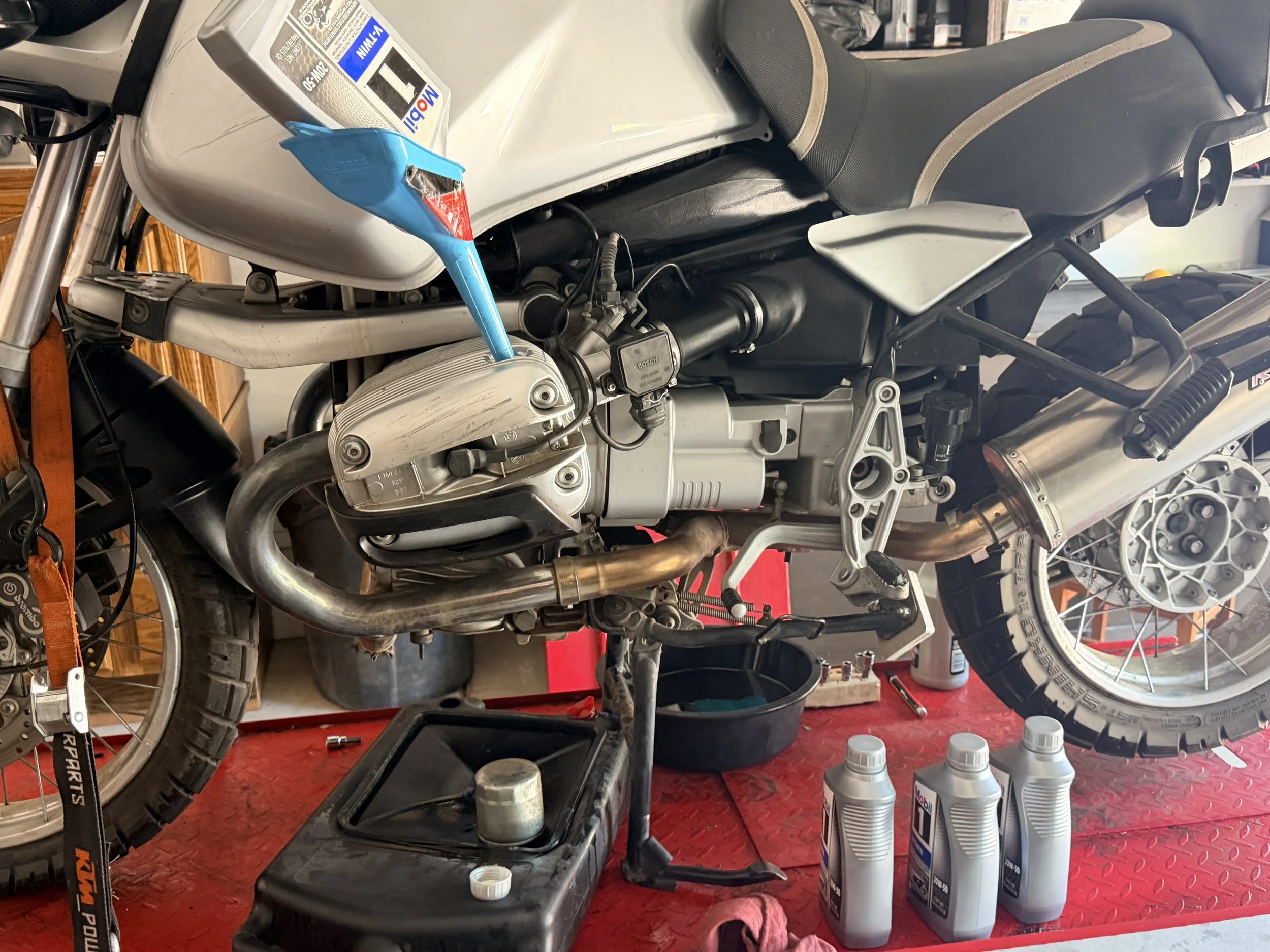 Engine oil & filter replaced - Mobil1 V-Twin 20W-50 & HF-163 filter. 