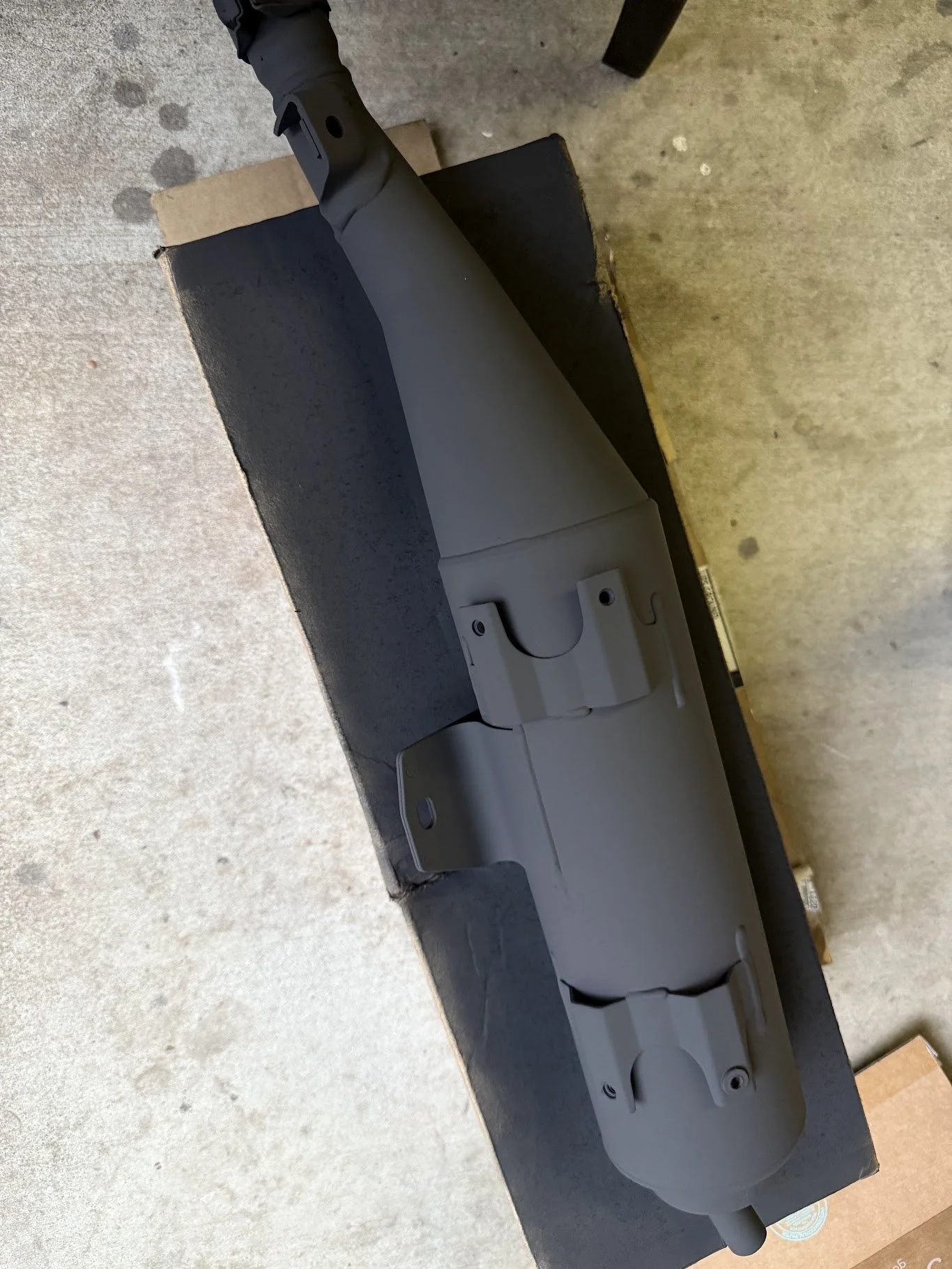 This VHT high-temp paint looks factory (although slightly more matte). I like the look. 