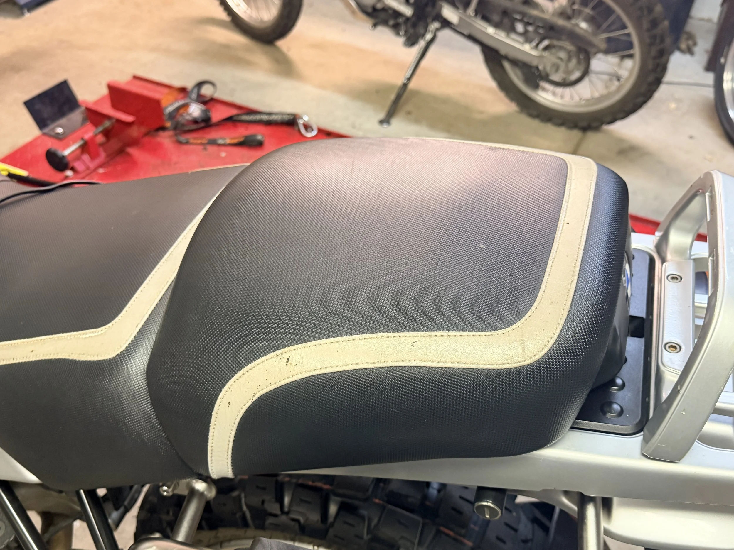 I wanted to transform the look of the bike. An absolutely terrible customer experience with Unit Garage. One month later, seat covers, fork boots, and stickers arrived. 