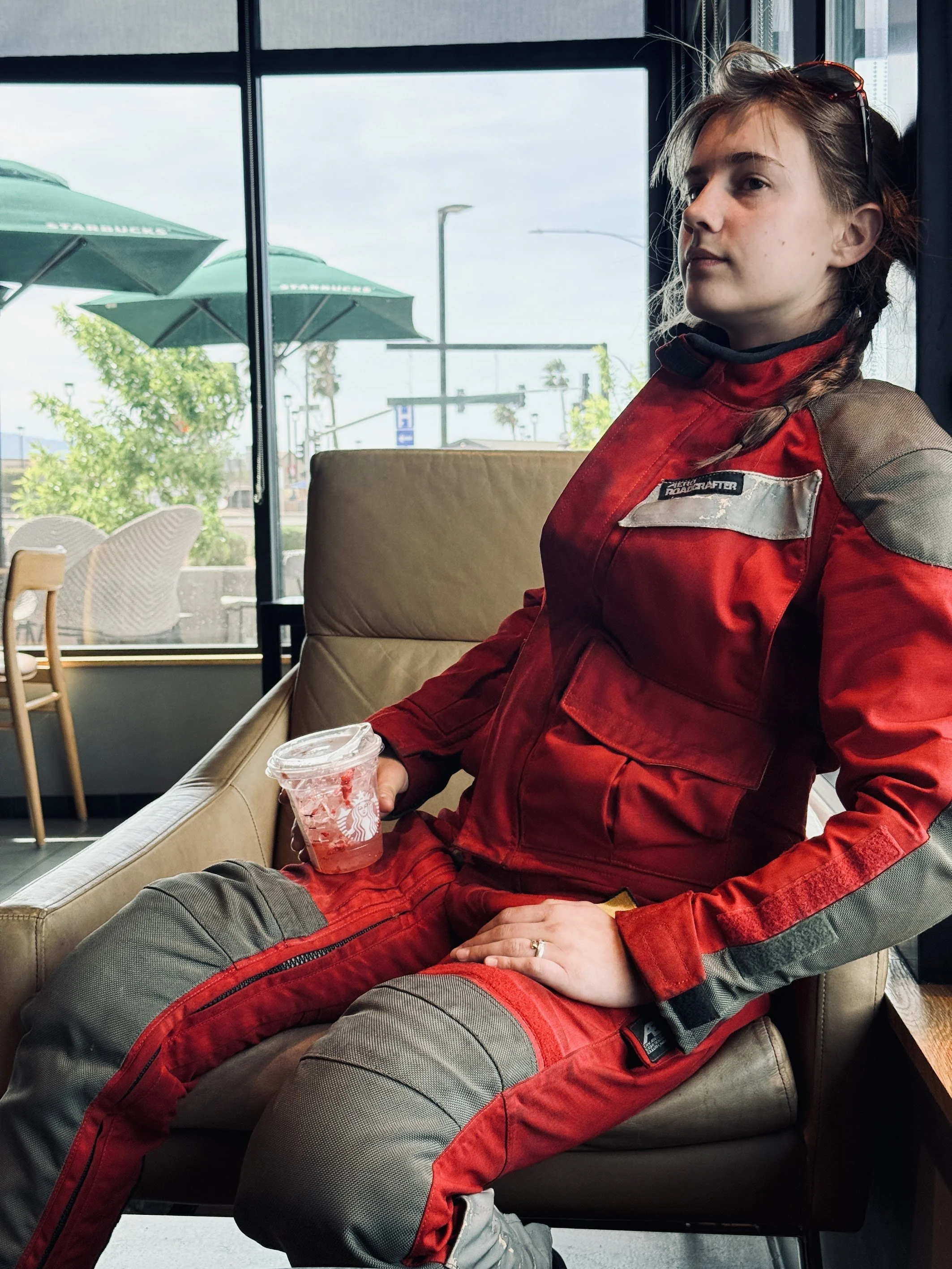 Chilling at Starbucks, taking a break from the brutal winds and sand that were on us all day. 